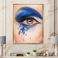 Dizajnerska umjetnost Izbliza smeđih očiju s maštovitom plavom šminkom Moderni uokvireni zidni otisak na platnu